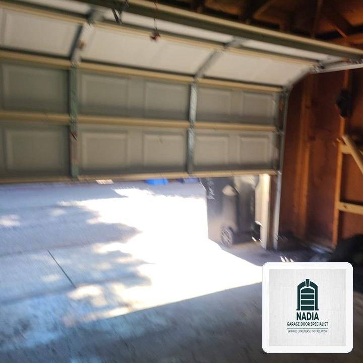 Off-Track Garage Door Emergency Realignment & Laser Calibration in New Braunfels, TX
